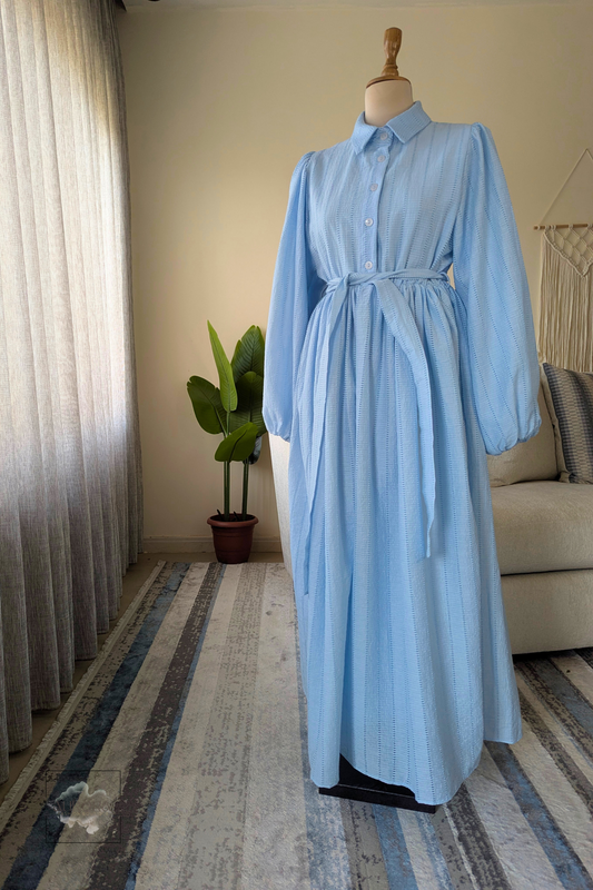 Aurora modest A-line cotton dress in baby blue with fabric belt and balloon sleeves. Perfect for hijabi