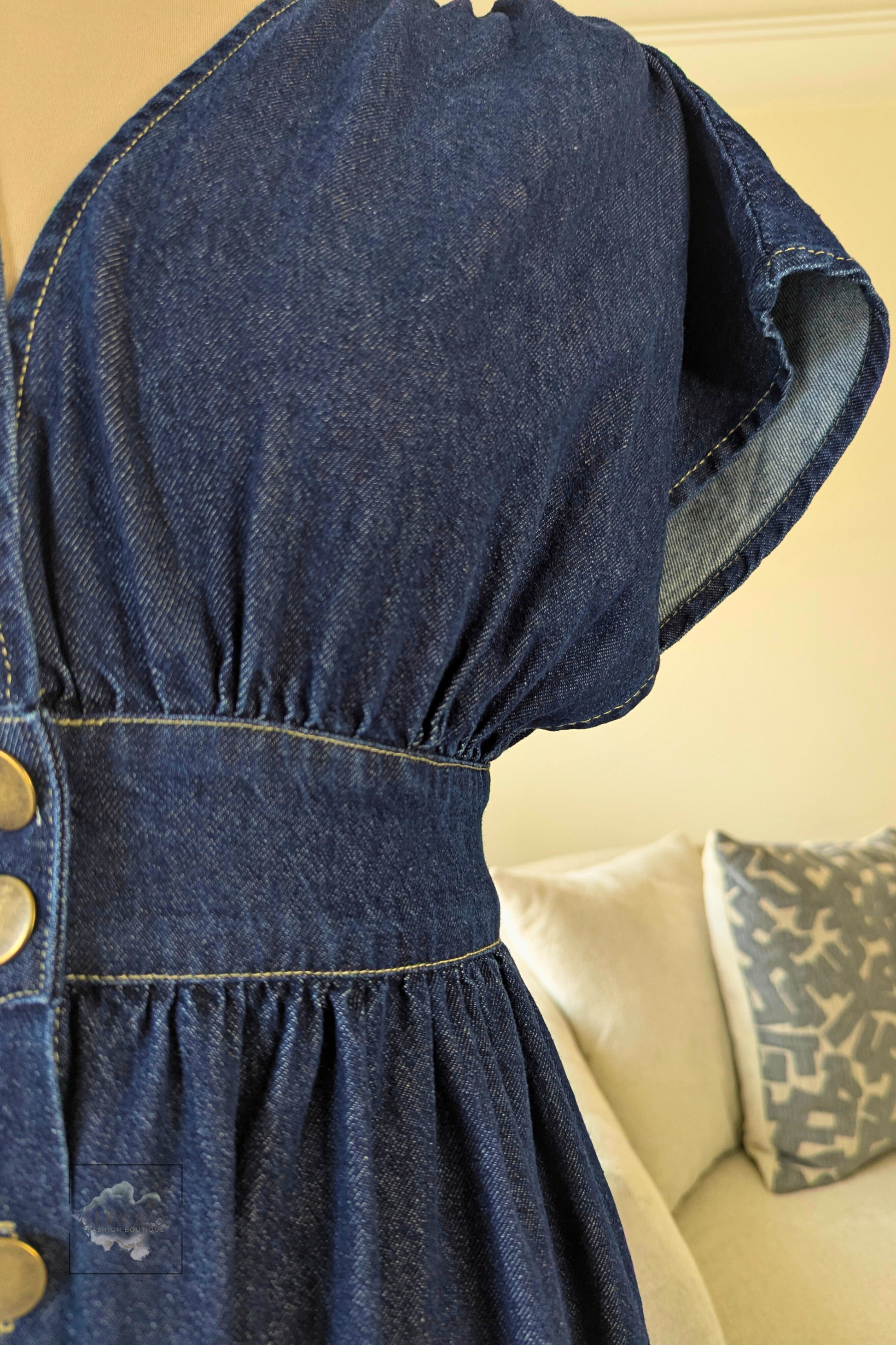 Blue denim A-line maxi dress with stitched waist detail and button closure