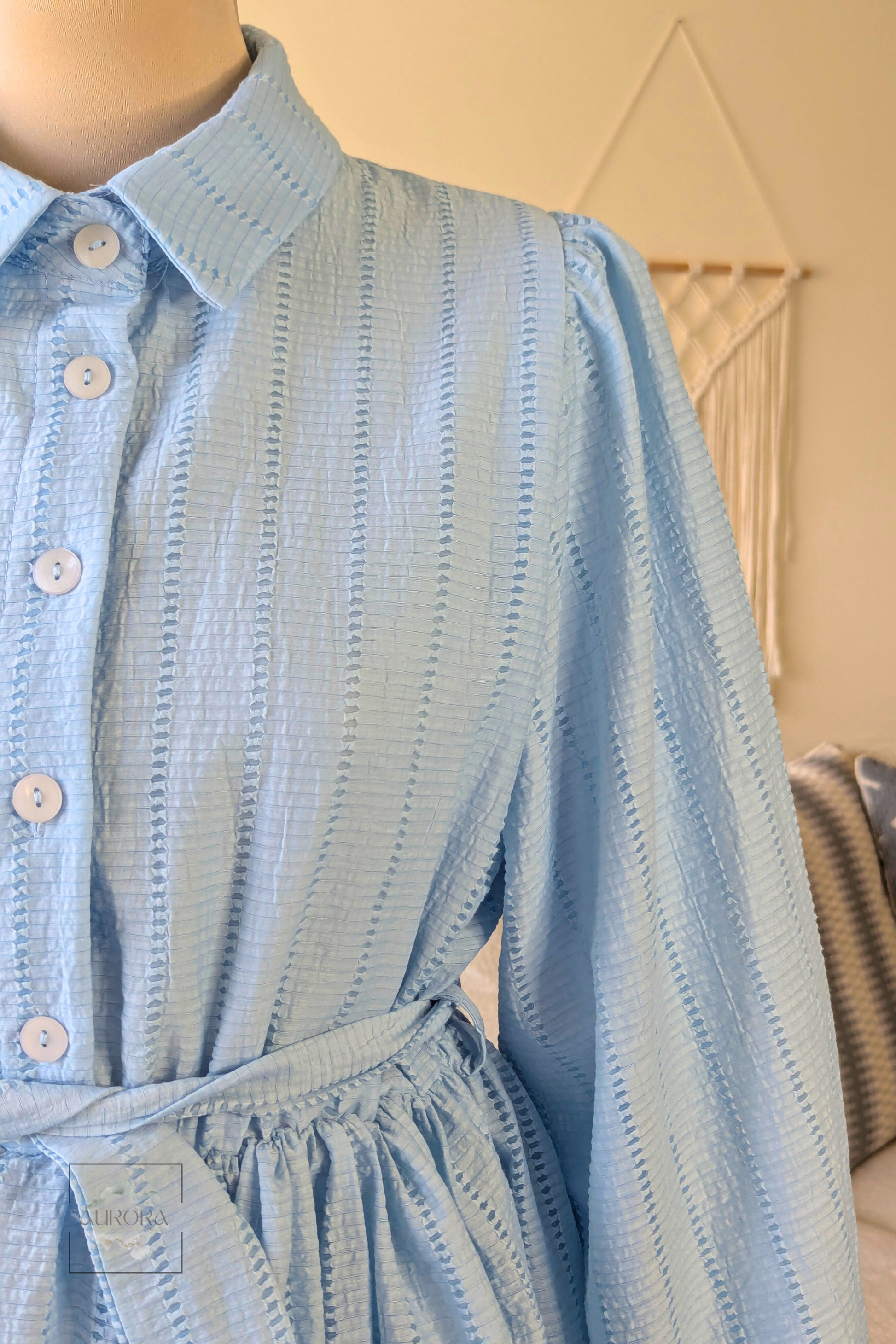 Aurora modest A-line cotton dress in baby blue with fabric belt and balloon sleeves. Perfect for hijabi