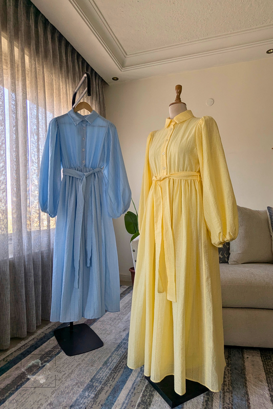 Aurora modest A-line cotton dress in baby blue or yellow with fabric belt and balloon sleeves. Perfect for hijabi
